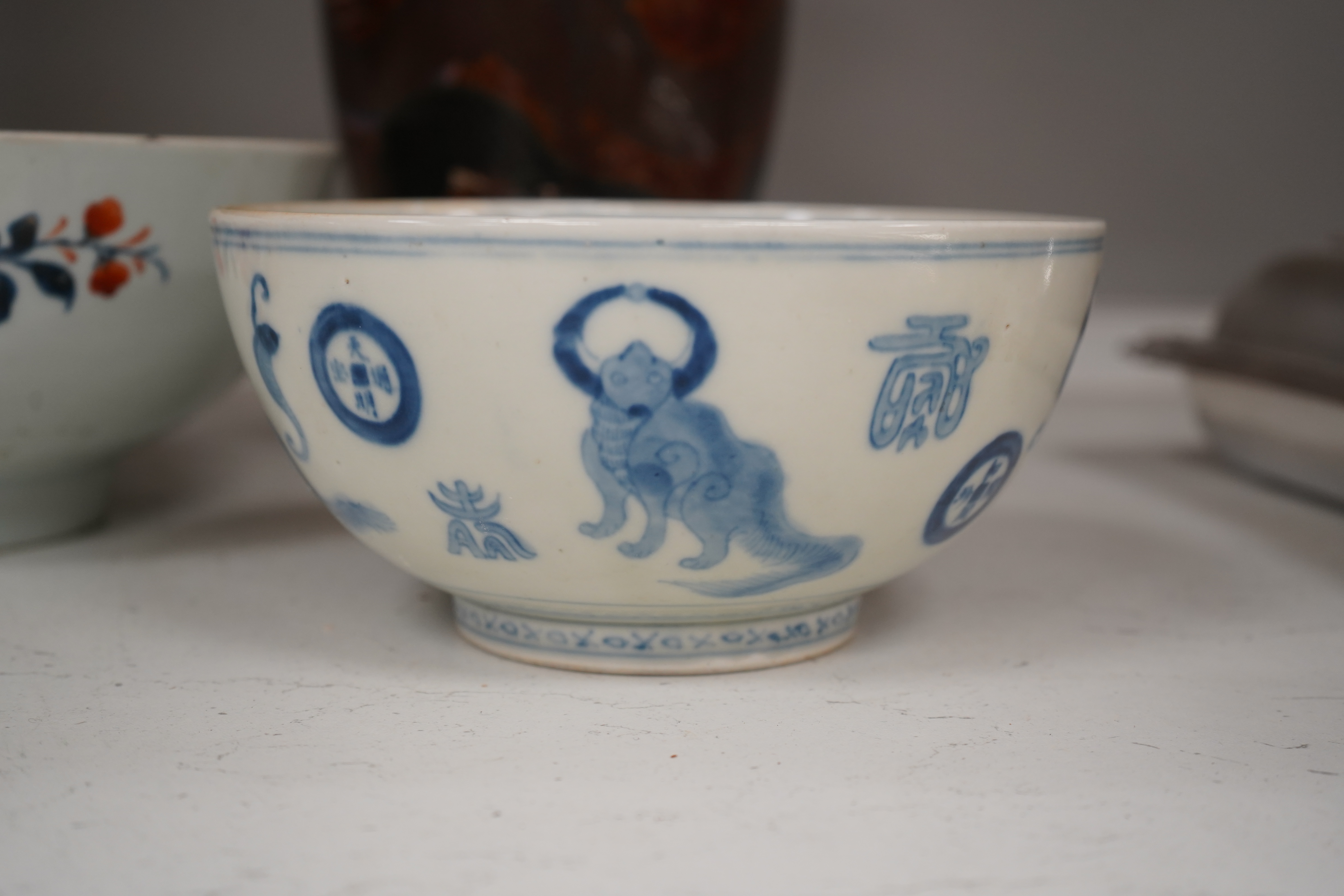 Three pieces of Chinese and Japanese ceramics to include an 18th century Chinese export bowl and a cloisonné ‘dragon’ vase, 31cm high. Condition - fair